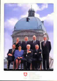 The photo with 8 persons. 148x210mmIt is Chairman Flavio Cotti in front row third person from left.